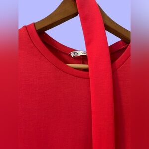 Twice worn, pink-red stretchy dress with belt.             Like new!